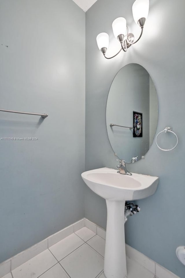 bathroom with tile patterned floors