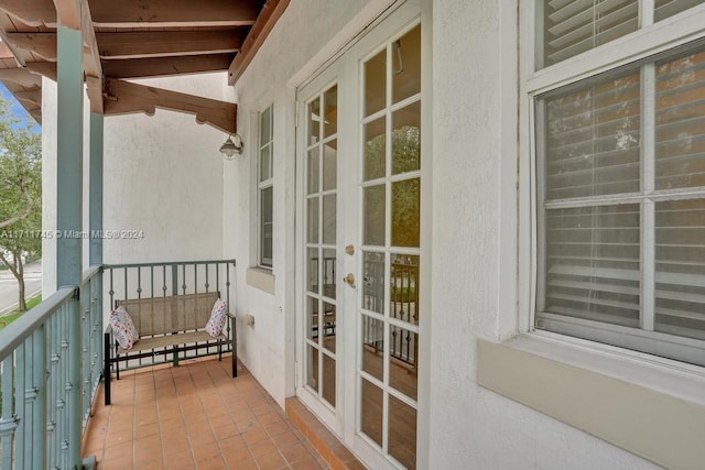 balcony featuring french doors