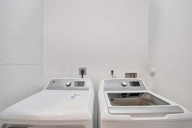 laundry room featuring independent washer and dryer