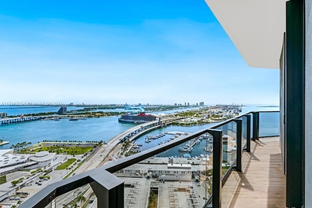 balcony featuring a water view