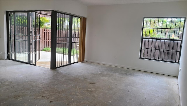 empty room featuring concrete floors