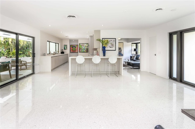 kitchen featuring a breakfast bar and a center island