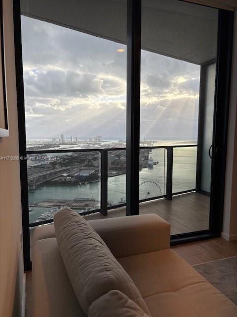 balcony featuring a water view