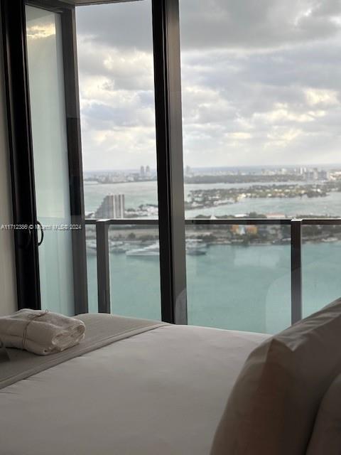 bedroom with a water view