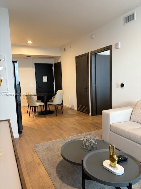 living room featuring light hardwood / wood-style flooring