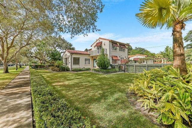 view of yard with a balcony