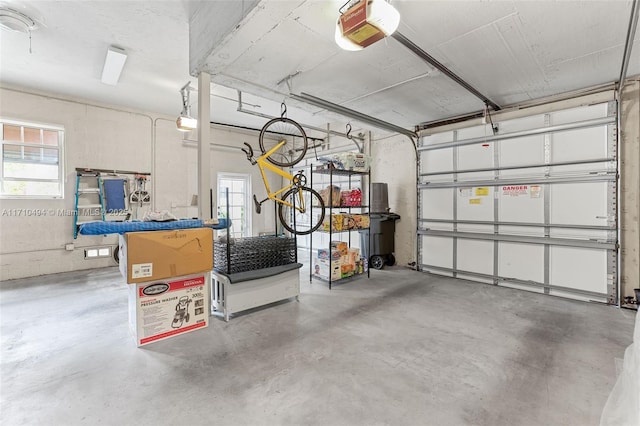 garage featuring a garage door opener