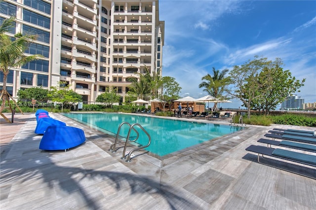 community pool with a patio