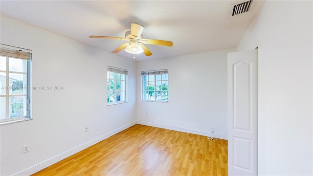 spare room featuring ceiling fan and wood-type flooring