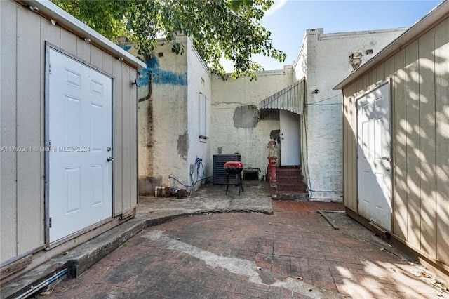 view of patio with central AC unit