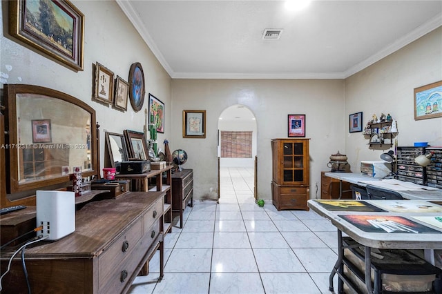 interior space featuring crown molding and light tile patterned floors