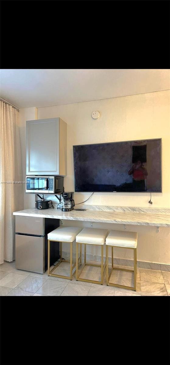 kitchen featuring gray cabinets