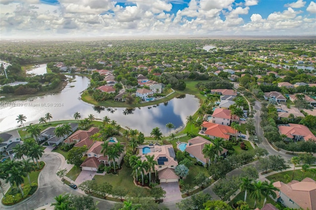 bird's eye view with a water view