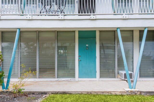 1155 103rd St Unit 7A, Bay Harbor Islands, FL 33154 - property entrance with a balcony