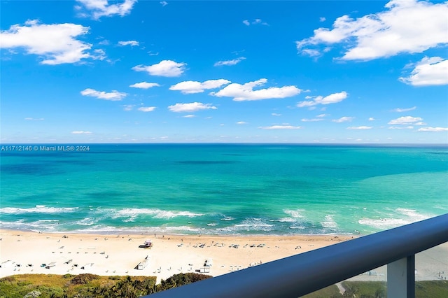 property view of water featuring a beach view