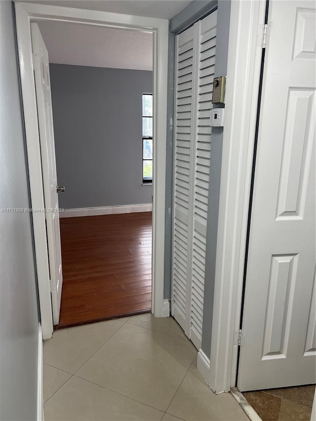 hallway with light wood-type flooring