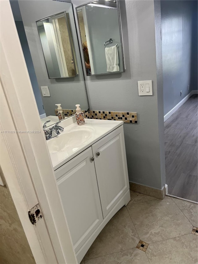 bathroom with vanity and tile patterned floors