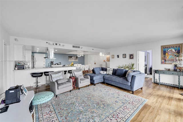 living room featuring light hardwood / wood-style flooring