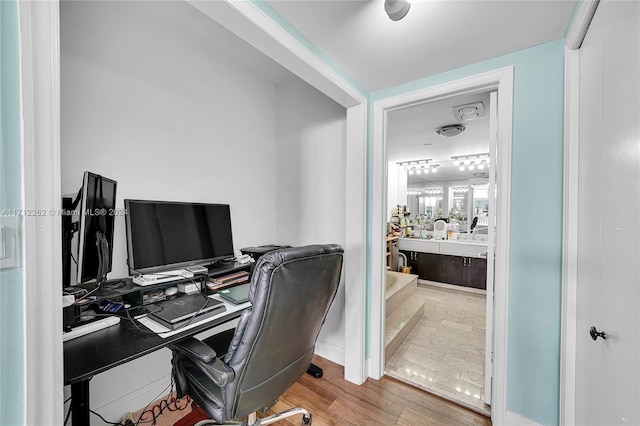 office area with wood-type flooring