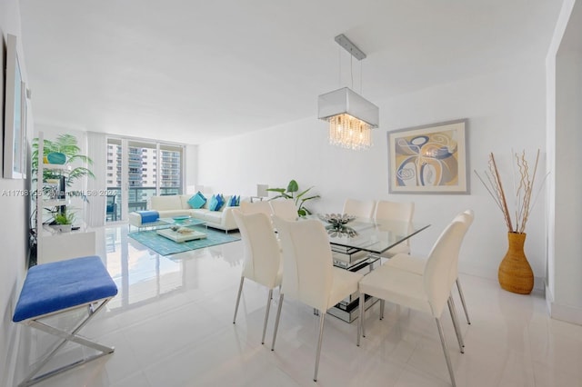 tiled dining space with a notable chandelier