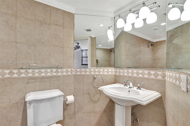 bathroom featuring toilet, tile walls, ornamental molding, and ceiling fan