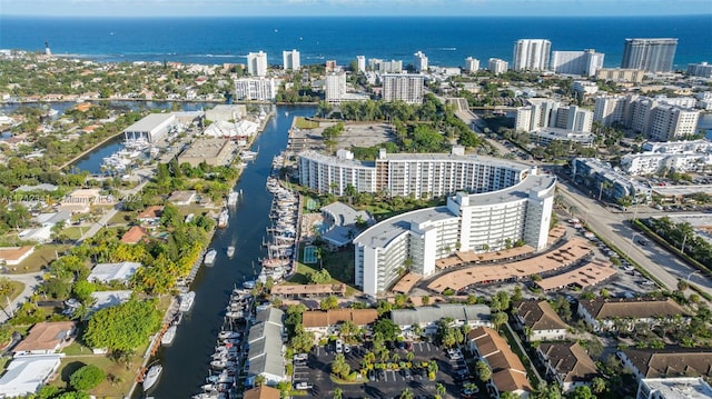 birds eye view of property featuring a water view