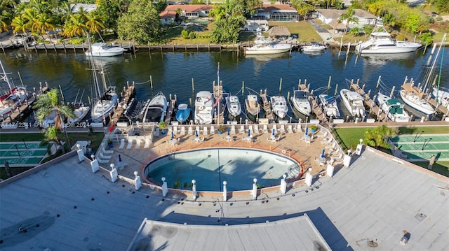 birds eye view of property featuring a water view