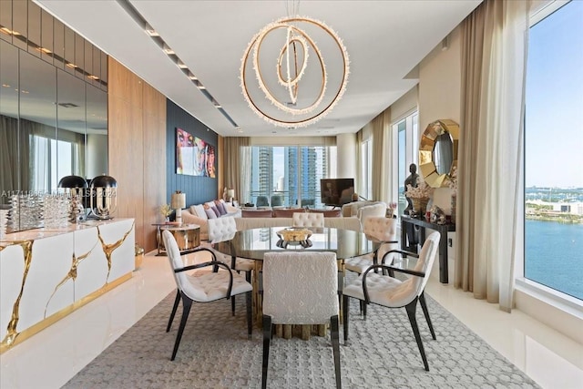 dining area featuring a notable chandelier