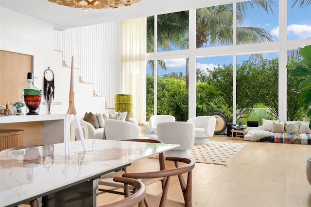 3726 Prairie Ave, Miami Beach, FL 33140 - dining room with plenty of natural light, wood finished floors, and floor to ceiling windows