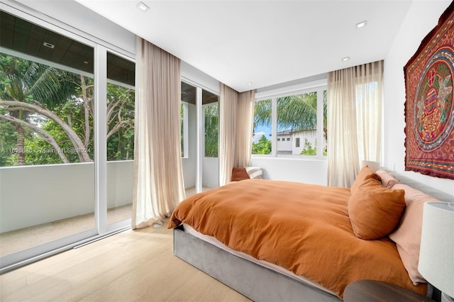 bedroom with light hardwood / wood-style floors