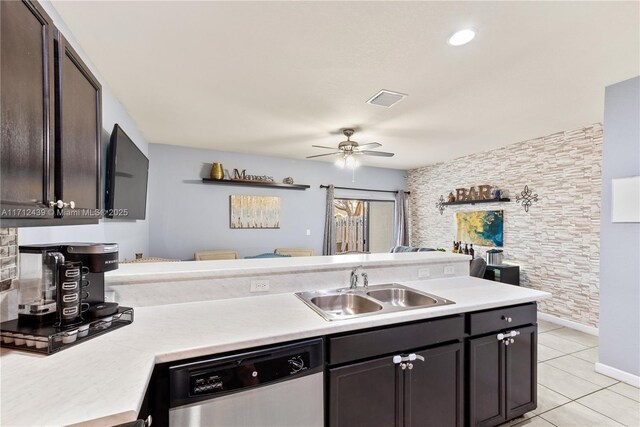 3217 SE 4th Ct Unit 3217, Homestead, FL 33033 - kitchen with stainless steel dishwasher, a ceiling fan, light tile patterned flooring, light countertops, and a sink