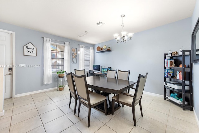 3217 SE 4th Ct Unit 3217, Homestead, FL 33033 - dining space with visible vents, baseboards, a notable chandelier, and light tile patterned flooring