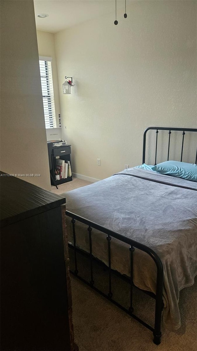 bedroom featuring carpet floors