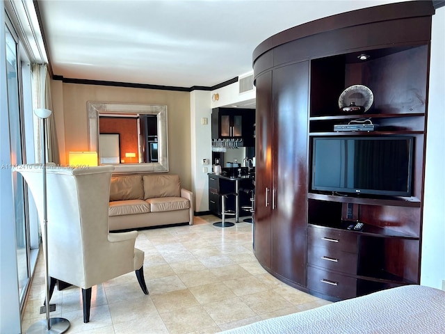 living room featuring ornamental molding and bar