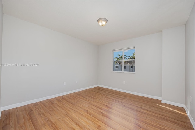 unfurnished room featuring light hardwood / wood-style floors