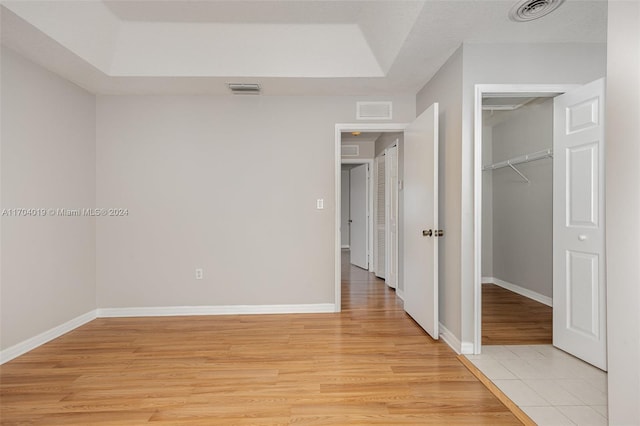 unfurnished bedroom featuring light wood-type flooring