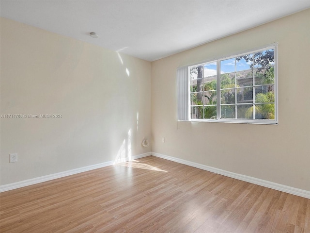 empty room with light wood-type flooring