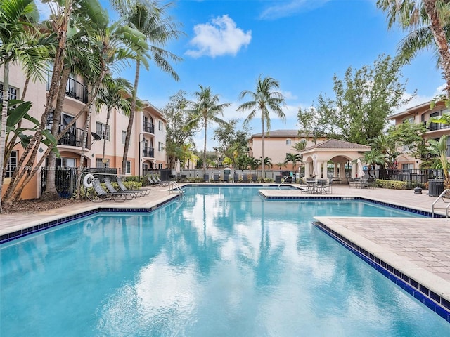 view of swimming pool featuring a patio area