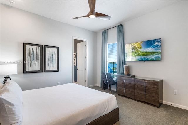 bedroom featuring ceiling fan and carpet