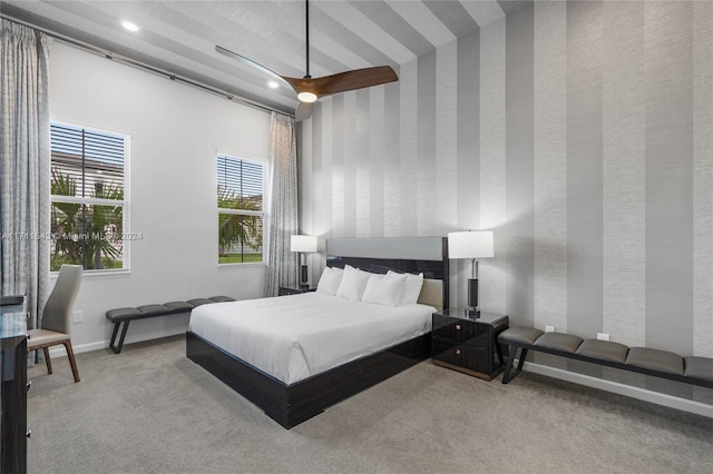 bedroom featuring ceiling fan and carpet floors