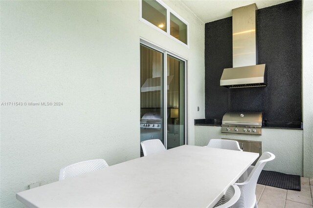 dining room featuring light tile patterned flooring