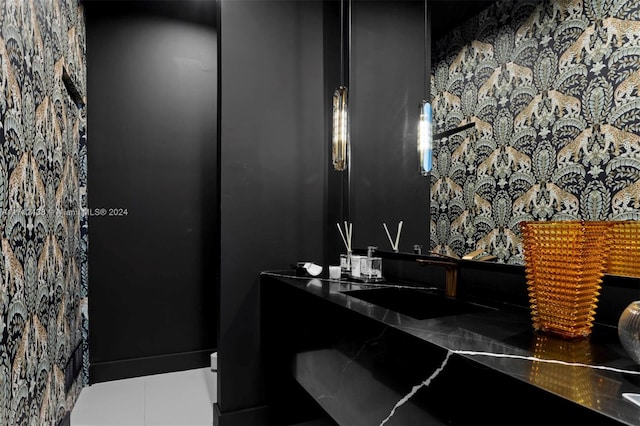 bathroom featuring tile patterned floors and vanity