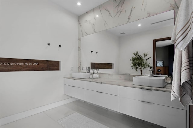 bathroom with vanity and tile patterned floors