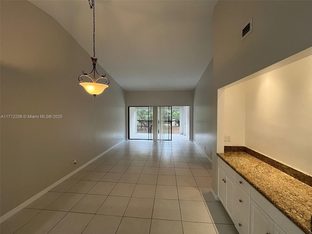 interior space featuring high vaulted ceiling