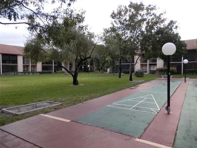 view of home's community featuring a lawn