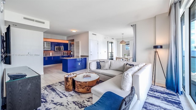 living room with hardwood / wood-style flooring