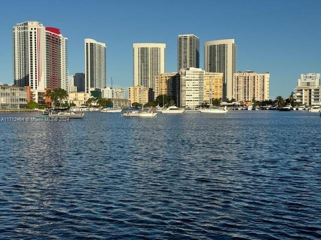 450 Golden Isles Dr Unit 1C, Hallandale Beach, FL 33009 - water view featuring city skyline