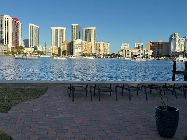 450 Golden Isles Dr Unit 1C, Hallandale Beach, FL 33009 - water view featuring city skyline