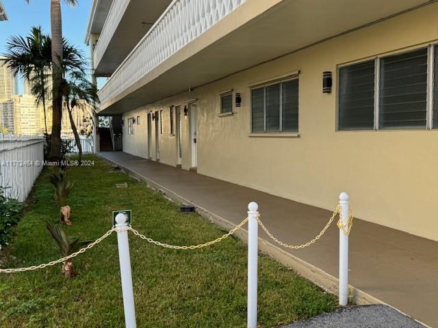 view of home's exterior featuring a lawn