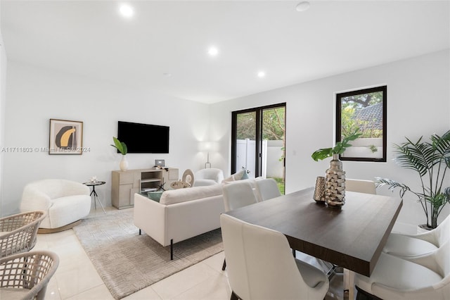 living room with light tile patterned flooring